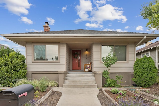 1873 S Lincoln St E, Salt Lake City, UT 84105 - bungalow-style home featuring a chimney and a garden