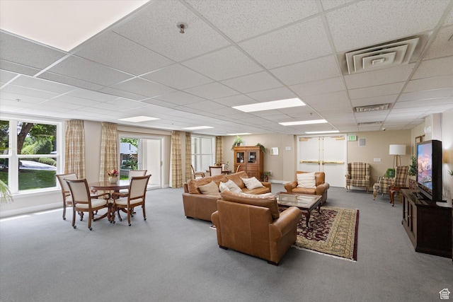 3075 E Kennedy Dr Unit 315, Salt Lake City, UT 84108 - living area featuring a paneled ceiling and carpet flooring