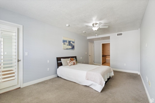 3075 E Kennedy Dr Unit 315, Salt Lake City, UT 84108 - carpeted bedroom featuring a textured ceiling, ceiling fan, and ensuite bath