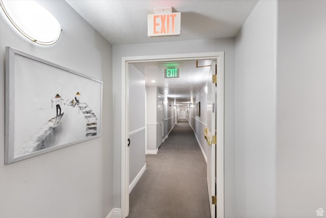 3075 E Kennedy Dr Unit 315, Salt Lake City, UT 84108 - hall with carpet floors and a textured ceiling