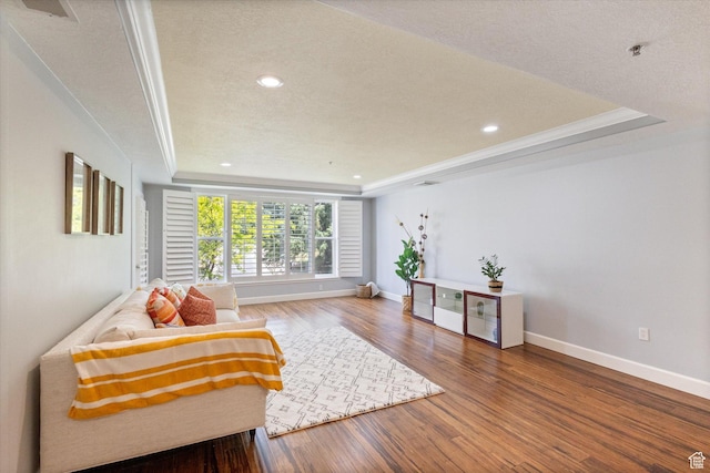 3075 E Kennedy Dr Unit 315, Salt Lake City, UT 84108 - living area with a tray ceiling, wood finished floors, recessed lighting, ornamental molding, and a textured ceiling