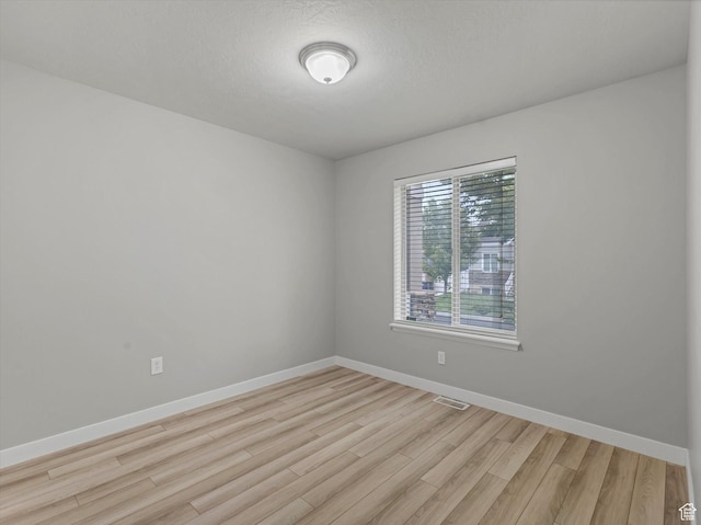 2296 S 2040 W, Woods Cross, UT 84087 - unfurnished room featuring light wood-style flooring and baseboards