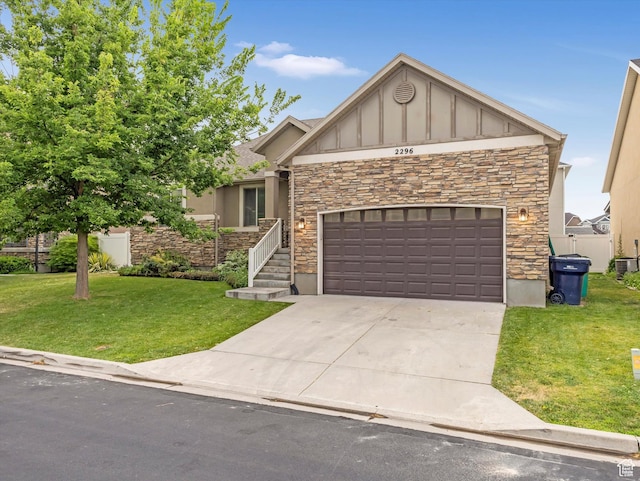 2296 S 2040 W, Woods Cross, UT 84087 - craftsman inspired home with stone siding, board and batten siding, and a front lawn