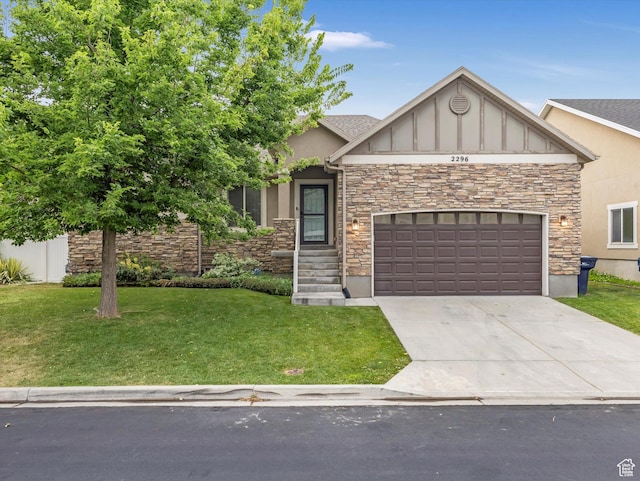 2296 S 2040 W, Woods Cross, UT 84087 - craftsman house with stone siding, a front yard, and a garage