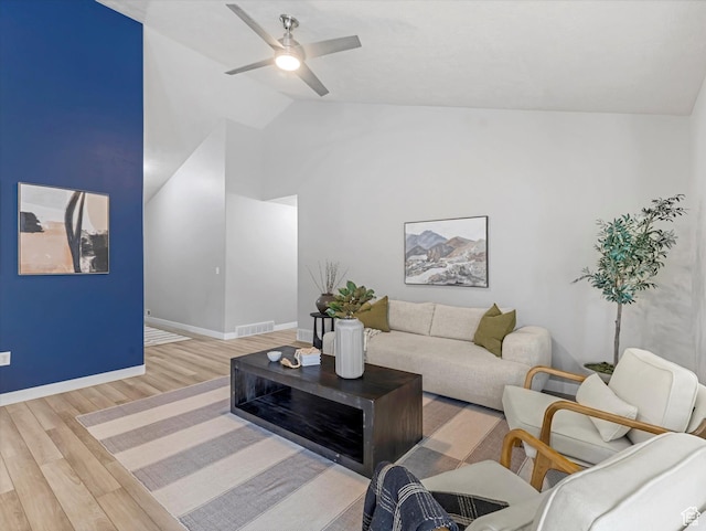 2296 S 2040 W, Woods Cross, UT 84087 - living area with wood finished floors, vaulted ceiling, and ceiling fan