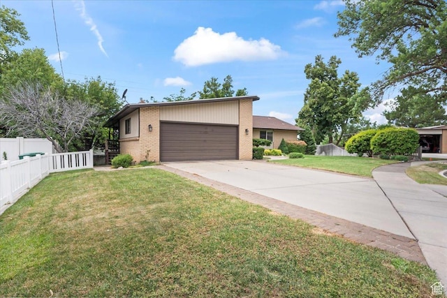 388 S Golden Circle Dr E, Fruit Heights, UT 84037 - mid-century inspired home with brick siding, driveway, and a garage