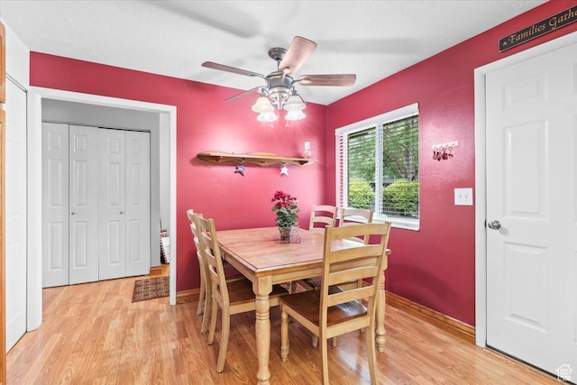 388 S Golden Circle Dr E, Fruit Heights, UT 84037 - dining room with light wood finished floors and a ceiling fan