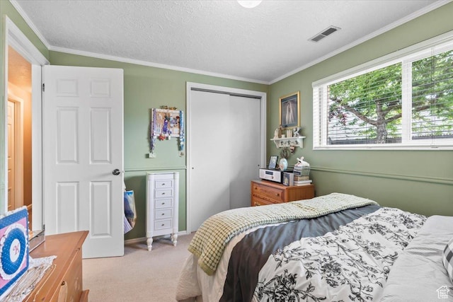 388 S Golden Circle Dr E, Fruit Heights, UT 84037 - carpeted bedroom featuring ornamental molding, a closet, and a textured ceiling