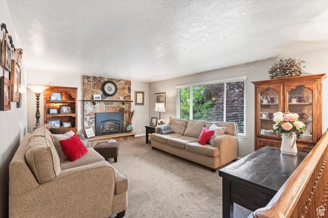 388 S Golden Circle Dr E, Fruit Heights, UT 84037 - carpeted living room with a textured ceiling and a fireplace