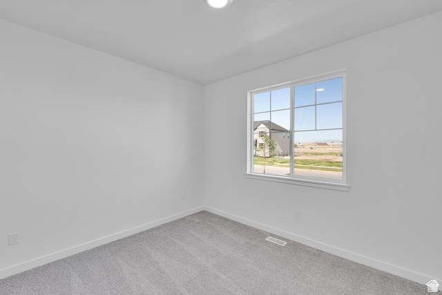 1089 S 3170 E Unit 205, Spanish Fork, UT 84660 - carpeted empty room with baseboards