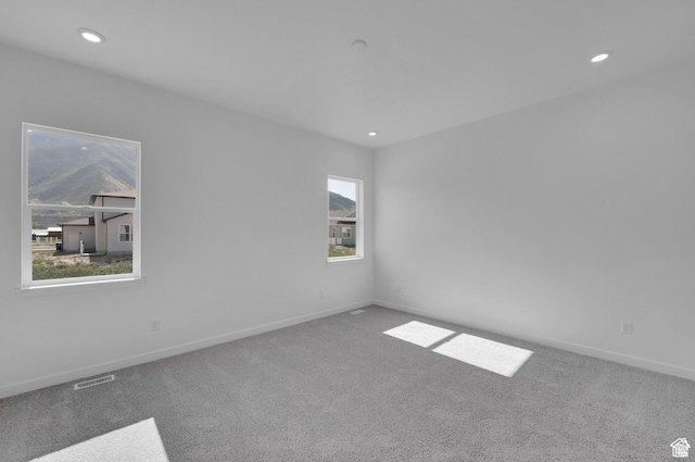 1147 S 3170 E Unit 207, Spanish Fork, UT 84660 - empty room with carpet and recessed lighting
