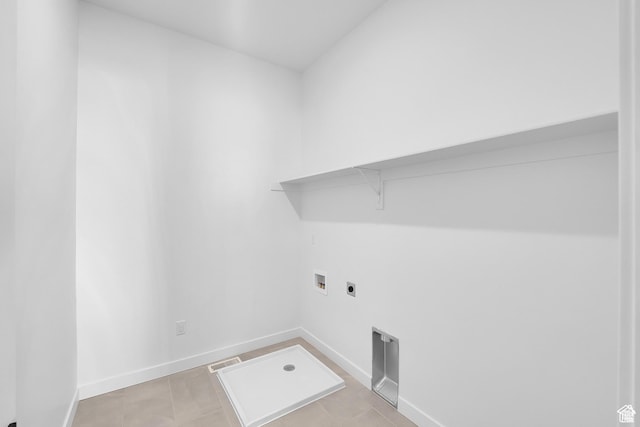 1147 S 3170 E Unit 207, Spanish Fork, UT 84660 - laundry area featuring hookup for a washing machine, electric dryer hookup, and light tile patterned floors