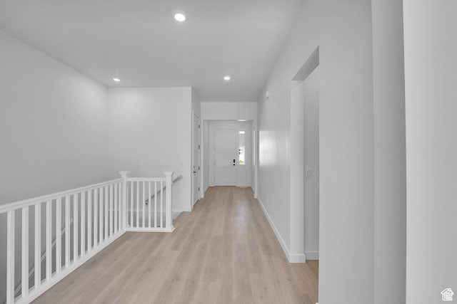 1147 S 3170 E Unit 207, Spanish Fork, UT 84660 - hallway featuring light wood-style flooring, recessed lighting, and an upstairs landing