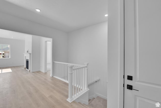 1147 S 3170 E Unit 207, Spanish Fork, UT 84660 - hallway with an upstairs landing, light wood-style floors, and recessed lighting