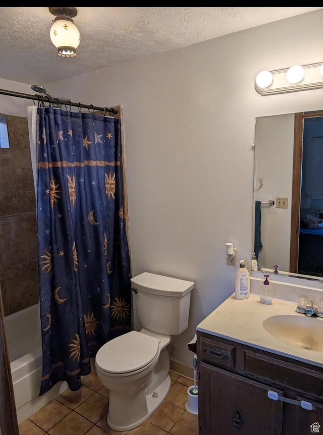 308 W 1050 N, Logan, UT 84321 - bathroom with tile patterned flooring, vanity, shower / bath combo, and a textured ceiling