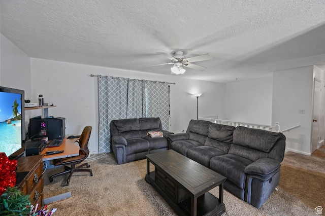 308 W 1050 N, Logan, UT 84321 - carpeted living room featuring a ceiling fan, an office area, and a textured ceiling