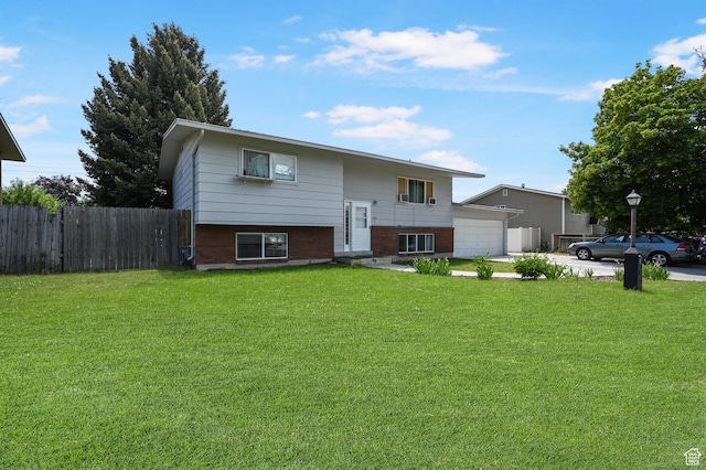 308 W 1050 N, Logan, UT 84321 - split foyer home featuring an attached garage and driveway