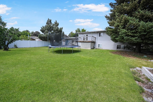 308 W 1050 N, Logan, UT 84321 - view of yard with a trampoline and a deck