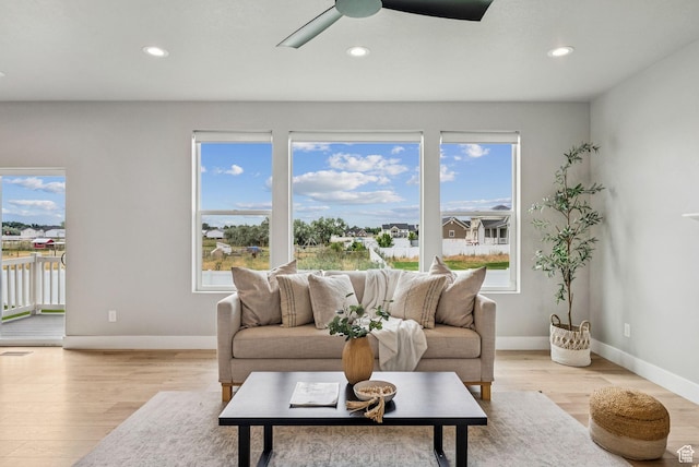 4269 W 2025 S, West Haven, UT 84401 - living room with a ceiling fan, recessed lighting, and light wood-style floors