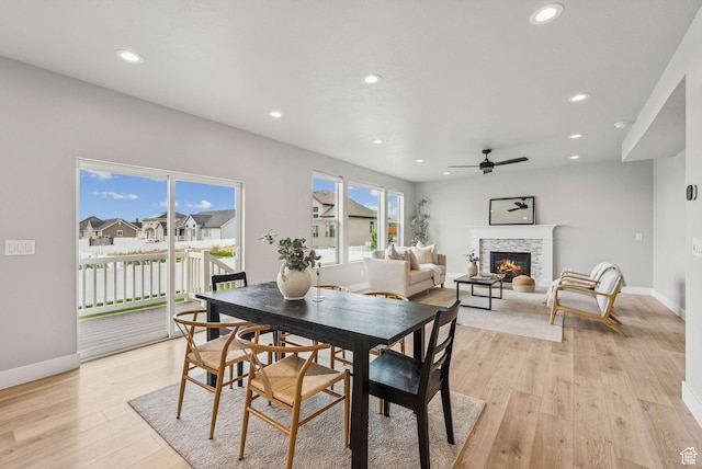 4269 W 2025 S, West Haven, UT 84401 - dining space featuring recessed lighting, a stone fireplace, light wood-type flooring, and ceiling fan