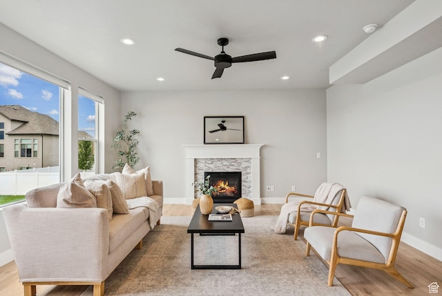 4269 W 2025 S, West Haven, UT 84401 - living room featuring a ceiling fan, recessed lighting, wood finished floors, and a fireplace