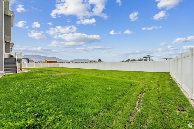 4269 W 2025 S, West Haven, UT 84401 - fenced backyard featuring a mountain view