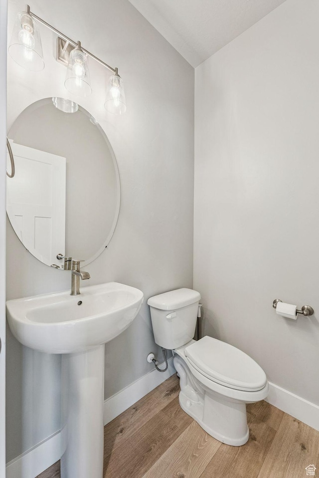 4269 W 2025 S, West Haven, UT 84401 - bathroom featuring toilet and wood finished floors