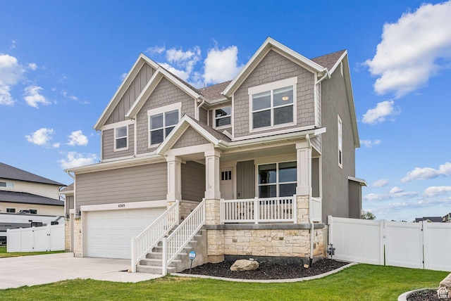 4269 W 2025 S, West Haven, UT 84401 - craftsman-style house with covered porch, driveway, a gate, and an attached garage