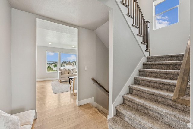 4269 W 2025 S, West Haven, UT 84401 - staircase with wood finished floors and baseboards