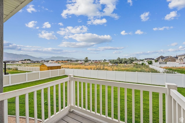 4269 W 2025 S, West Haven, UT 84401 - deck with a mountain view and a fenced backyard