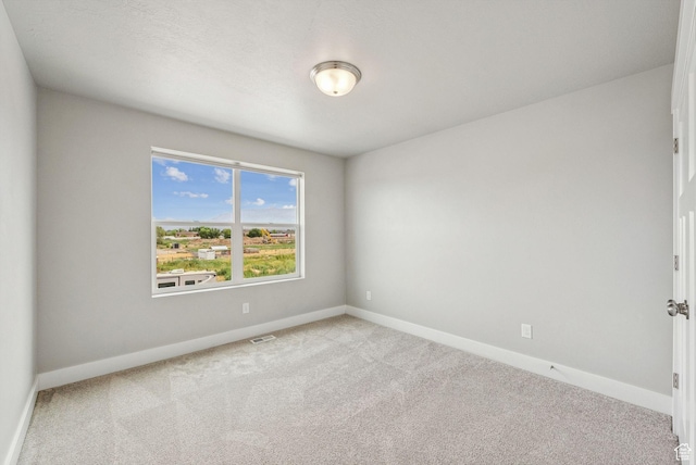 4269 W 2025 S, West Haven, UT 84401 - unfurnished room featuring baseboards and carpet floors