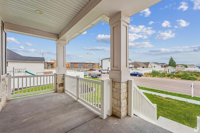 4269 W 2025 S, West Haven, UT 84401 - wooden porch featuring a residential view