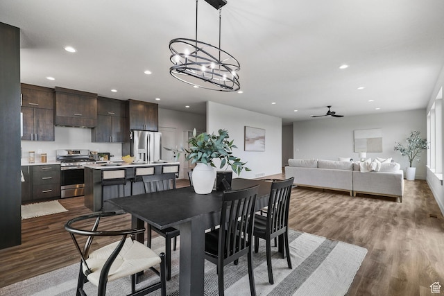 3071 N Mountain Rd Unit 4, North Ogden, UT 84414 - dining area with dark wood finished floors, recessed lighting, a chandelier, and a ceiling fan
