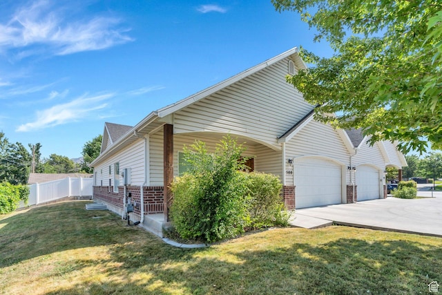 588 S 350 E, Pleasant Grove, UT 84062 - view of side of property featuring brick siding, an attached garage, concrete driveway, and a shingled roof