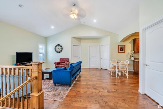 588 S 350 E, Pleasant Grove, UT 84062 - living area with ceiling fan, arched walkways, vaulted ceiling, light wood finished floors, and recessed lighting