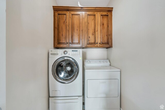 588 S 350 E, Pleasant Grove, UT 84062 - laundry area with cabinet space and separate washer and dryer