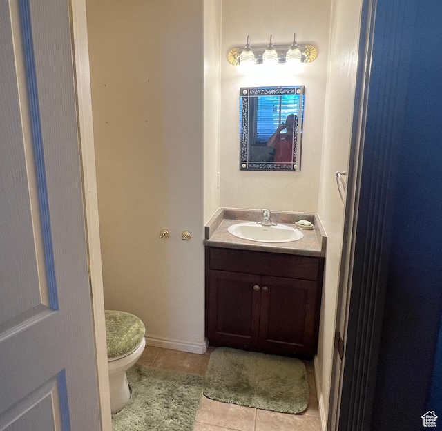 560 E 700 N, Logan, UT 84321 - half bath with tile patterned floors and vanity