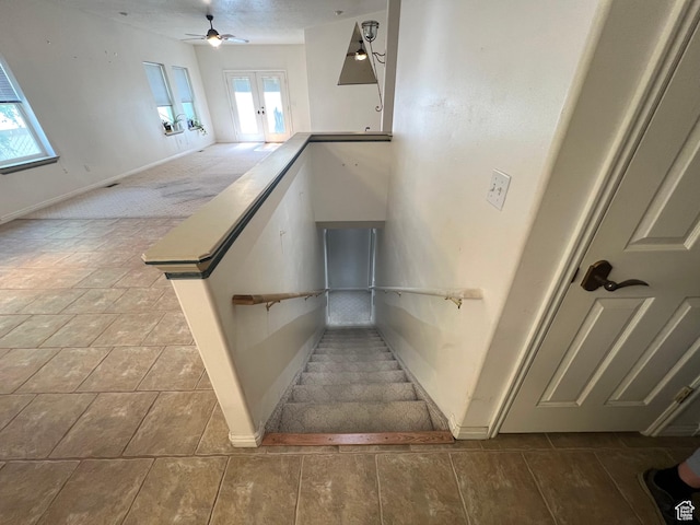 560 E 700 N, Logan, UT 84321 - stairway featuring healthy amount of natural light, french doors, and a ceiling fan