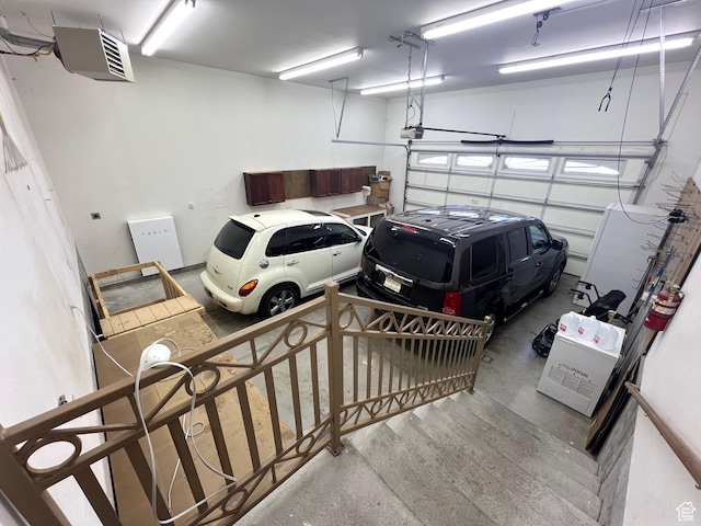560 E 700 N, Logan, UT 84321 - garage with a garage door opener and a heating unit