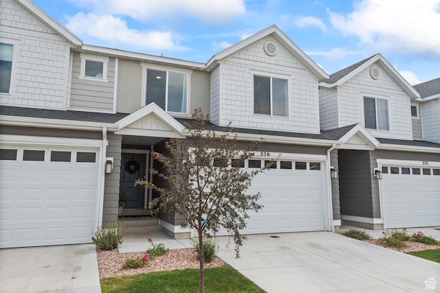 356 N Starboard Ln Unit 1555, Saratoga Springs, UT 84045 - view of property featuring a garage and driveway