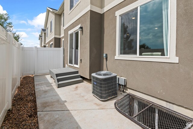 356 N Starboard Ln Unit 1555, Saratoga Springs, UT 84045 - fenced backyard featuring a patio area