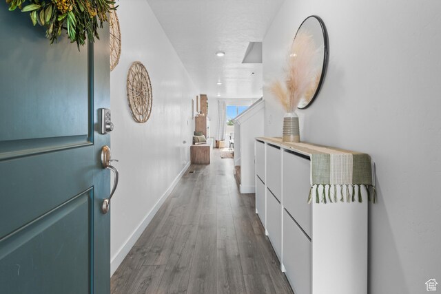 356 N Starboard Ln Unit 1555, Saratoga Springs, UT 84045 - corridor with dark wood finished floors and recessed lighting
