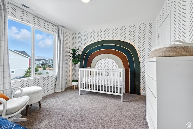 356 N Starboard Ln Unit 1555, Saratoga Springs, UT 84045 - bedroom with wallpapered walls, carpet, and a crib