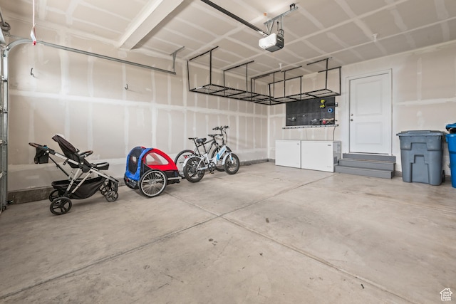 356 N Starboard Ln Unit 1555, Saratoga Springs, UT 84045 - garage with a garage door opener