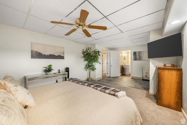 3561 S Jenelles Bay, West Valley City, UT 84119 - carpeted bedroom featuring a paneled ceiling, ensuite bathroom, and a ceiling fan