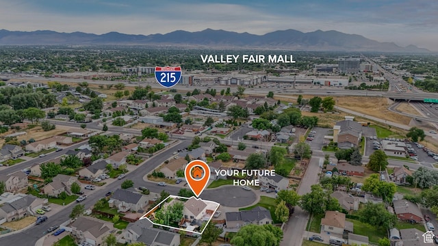 3561 S Jenelles Bay, West Valley City, UT 84119 - aerial view of property's location with a mountain backdrop and property boundaries highlighted
