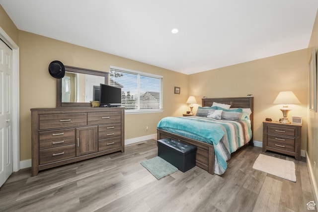 3561 S Jenelles Bay, West Valley City, UT 84119 - bedroom featuring light wood-style floors and recessed lighting
