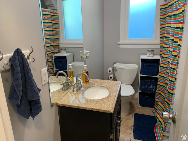 2425 Van Buren Ave, Ogden, UT 84401 - bathroom with vanity, tile patterned flooring, and plenty of natural light