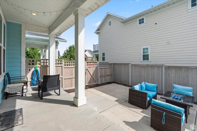 5131 W Mellow Way S, South Jordan, UT 84009 - fenced backyard with an outdoor living space, a patio area, and a gate