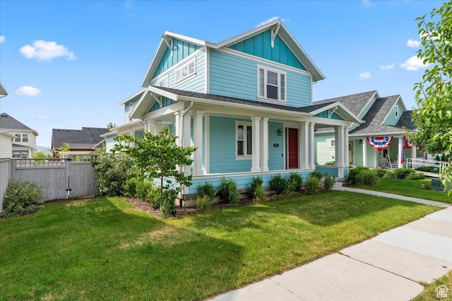 5131 W Mellow Way S, South Jordan, UT 84009 - view of front of home featuring board and batten siding, covered porch, and a gate